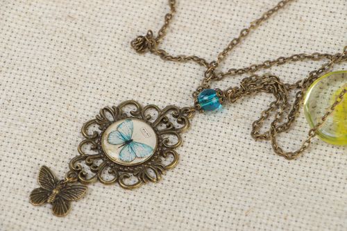 Handcrafted necklace in vintage style made of glass glaze with a butterfly - MADEheart.com