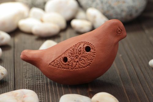 Small homemade brown clay penny whistle ocarina in the shape of bird - MADEheart.com