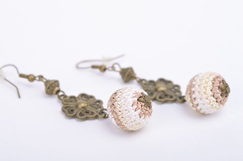 Handmade dangle earrings with metal fittings and light crocheted over beads - MADEheart.com