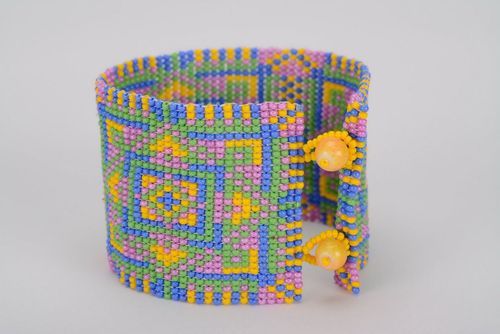 Eastern type wide beaded bracelet in green and orange colors - MADEheart.com