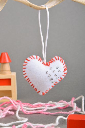 Handmade decorative wall hanging pincushion sewn of white and red fleece - MADEheart.com
