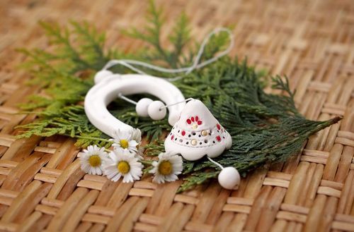 Hanging ceramic bell with horseshoe - MADEheart.com
