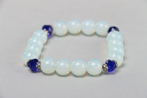 Handmade stretch wrist bracelet with moon stone and blue glass beads for women - MADEheart.com