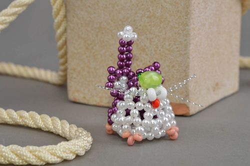 Handmade small souvenir beaded figurine of cat of bright violet color - MADEheart.com