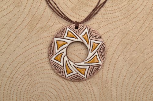 Round clay pendant in ethnic style - MADEheart.com