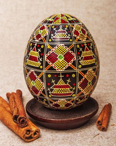 Black pysanka with red and yellow ornament - MADEheart.com