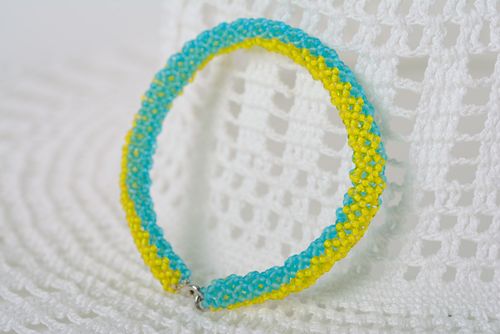 Thin handmade wrist bracelet woven of yellow and blue beads in Ukrainian style - MADEheart.com