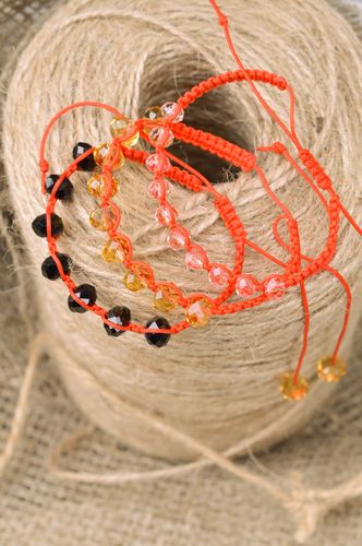 Set of stylish handmade wrist bracelets woven of beads and threads of red color 3 items - MADEheart.com