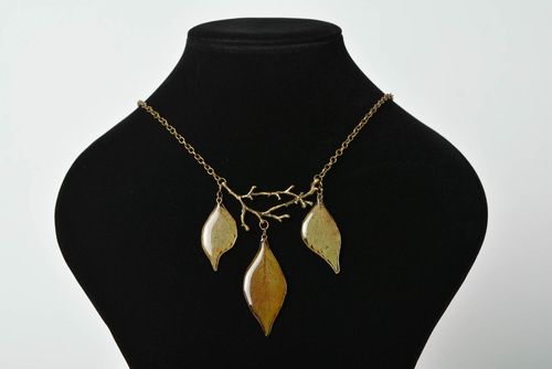 Unusual handmade designer necklace with dried flowers and epoxy coating - MADEheart.com