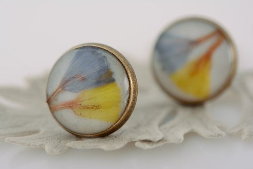 Handmade yellow and blue womens stud earrings with dried flower petals coated with epoxy  - MADEheart.com