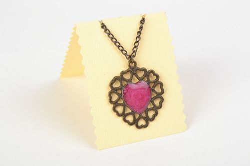 Handmade heart-shaped neck pendant with pink filler in jewelry glaze - MADEheart.com