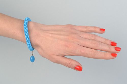 Handmade blue wrist bracelet crocheted of Czech beads with bead charm for women - MADEheart.com