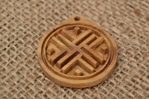 Wooden handmade amulet pendant made of acacia wood with Slavonic symbol Traveler - MADEheart.com