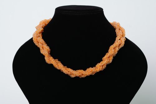Beautiful long handmade cord necklace woven of beads of peach color for women - MADEheart.com