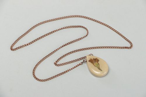 Handmade drop shaped pendant with flowers in epoxy resin on long chain Burdock - MADEheart.com