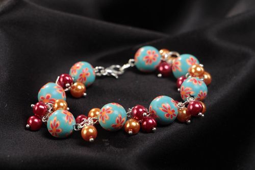 Handmade childrens plastic bracelet with ceramic pearls - MADEheart.com