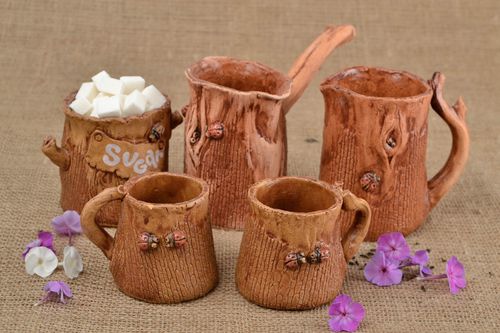 Decorative clay coffee set with coffee turk, milk pitcher, two cups, and sugar bowl in brown color - MADEheart.com