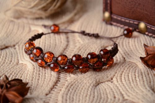 Wrist bracelet made of amber-like beads - MADEheart.com